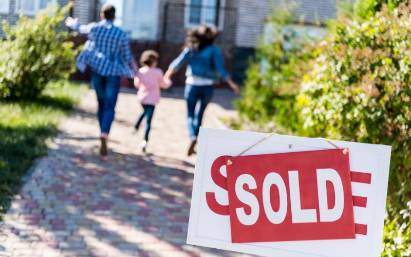 Listing agent helping homeowners sell their property