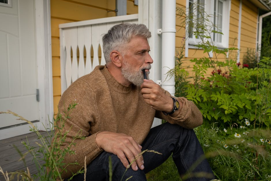 Senior man relaxing on a porch in a southern town