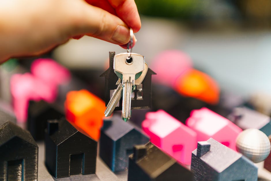 Miniature houses and keys representing rent-to-own housing options
