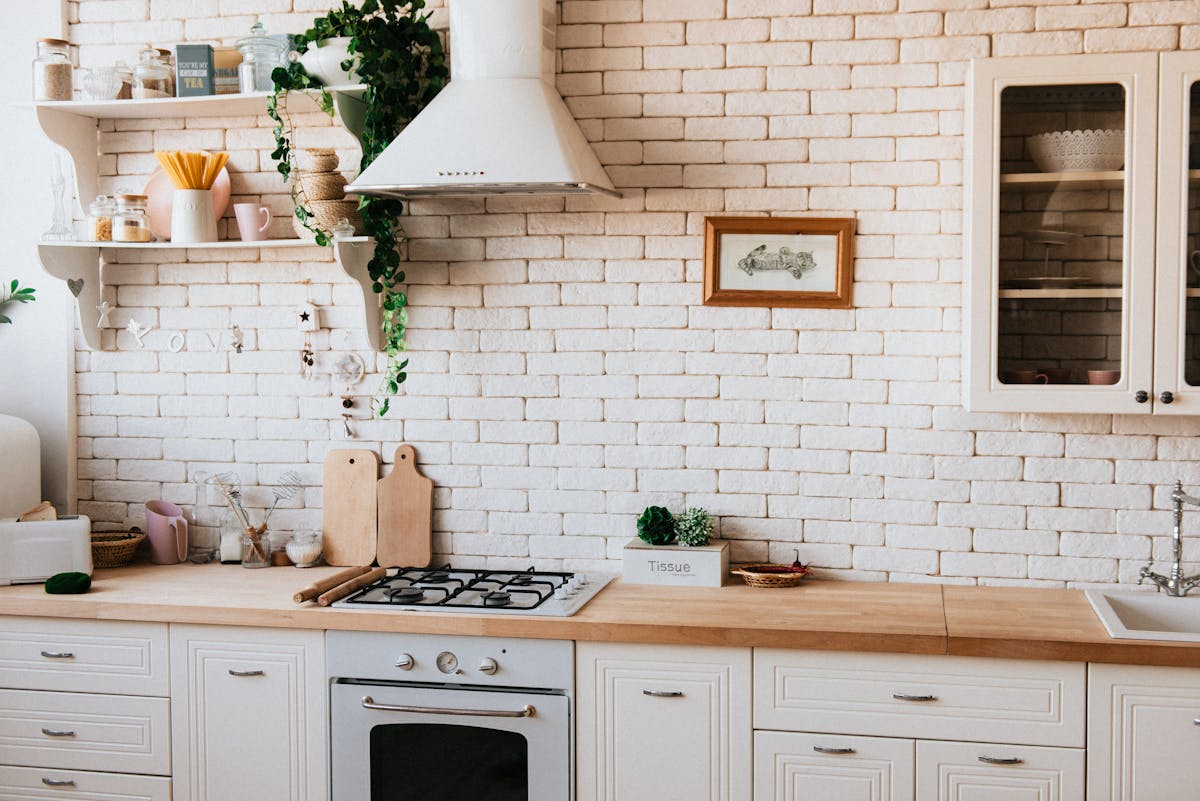 Professionally staged bathroom with fresh white towels, spa-like accessories, and clean modern design showcasing the value of staging investment