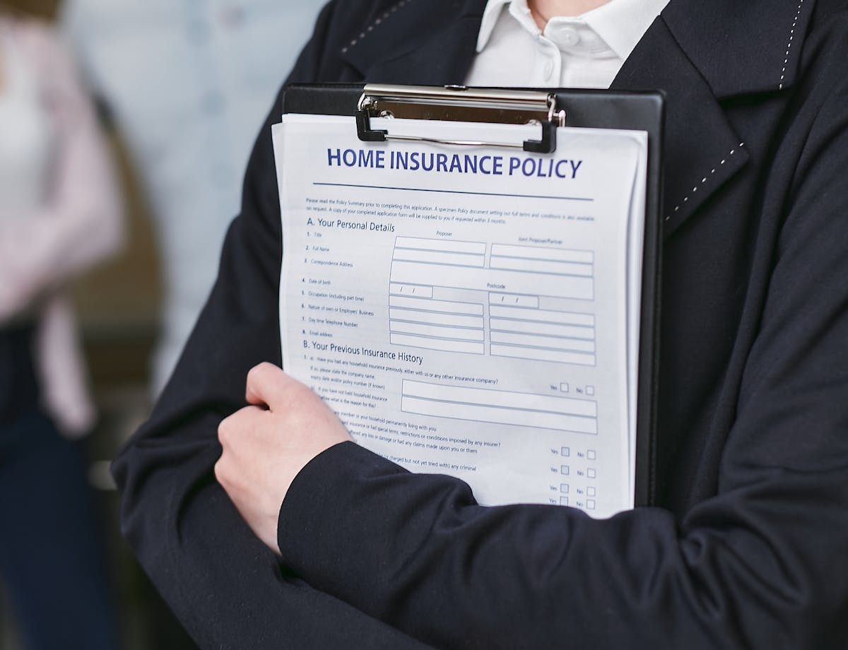 Family reviewing home purchase documents and strategies to avoid PMI